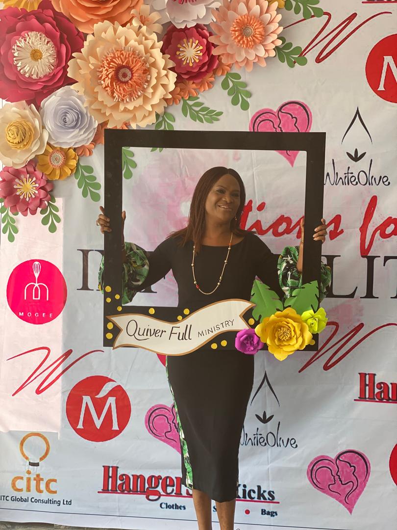 Cathy speaking with a woman